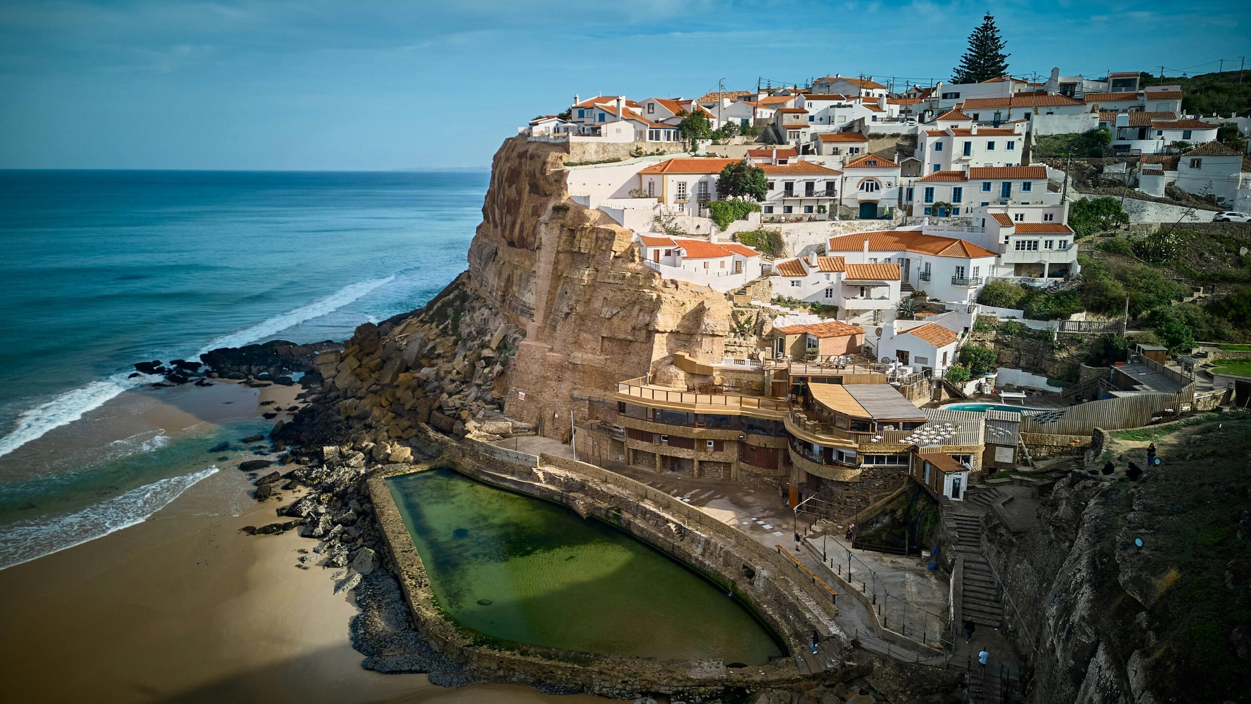 Stunning aerial view of the scenic coastal town near the cliffs of Cascais, Portugal.
