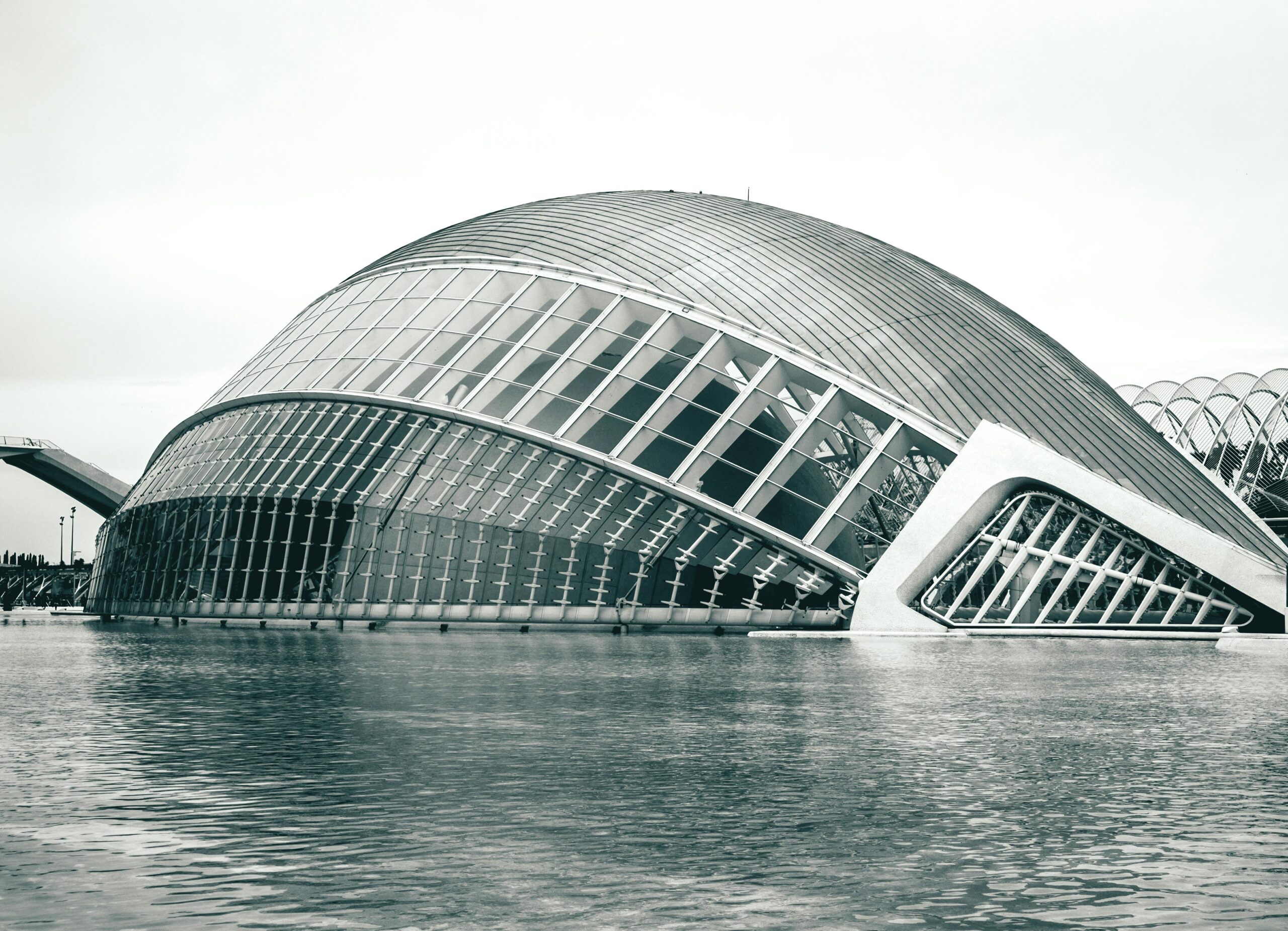 Grayscale view of the modern Hemispheric building in Valencia's City of Arts and Sciences.